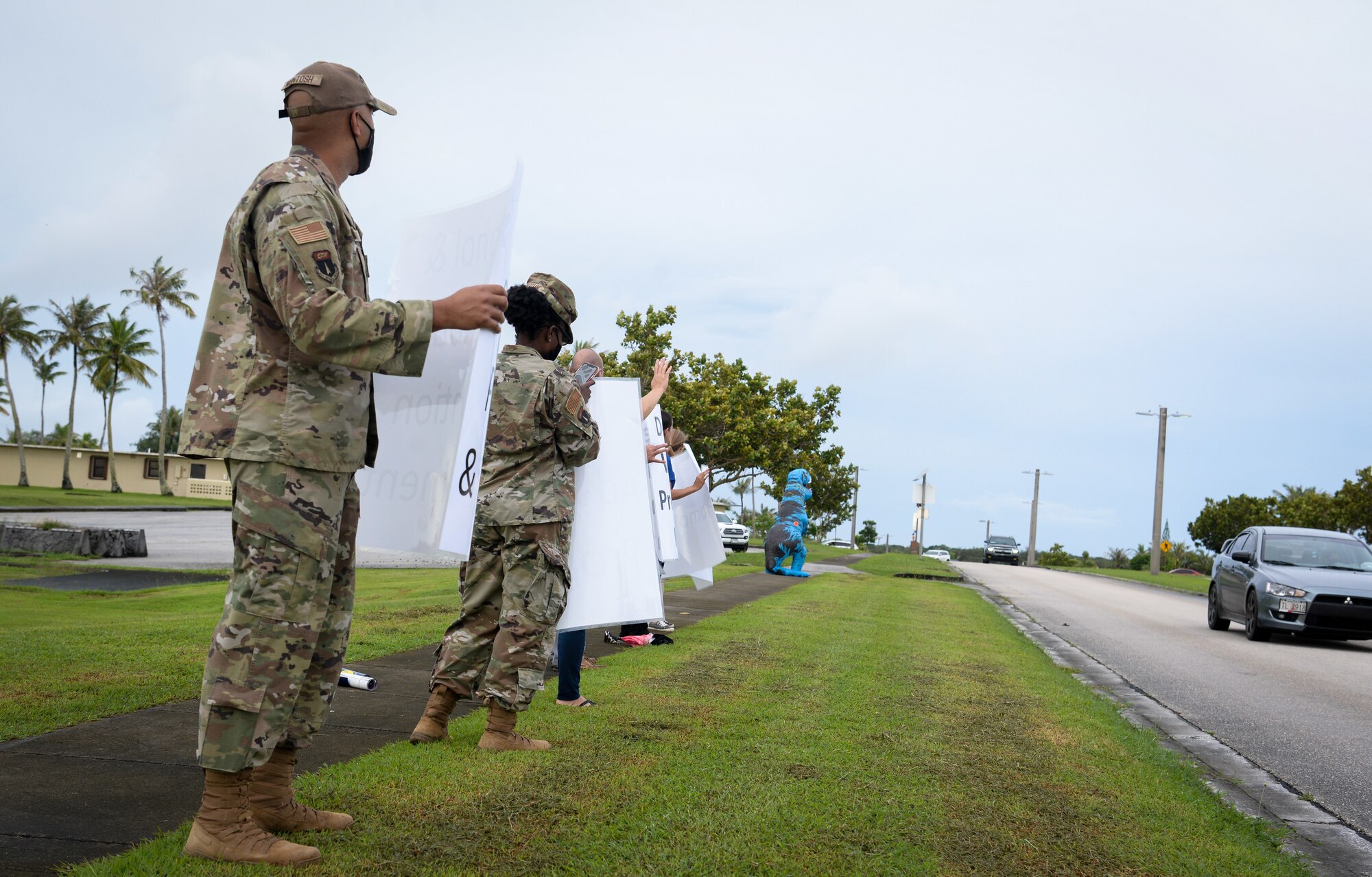 Members of Team Andersen participate in an awareness wave on Andersen Air Force Base, Guam, Oct. 4, 2021.