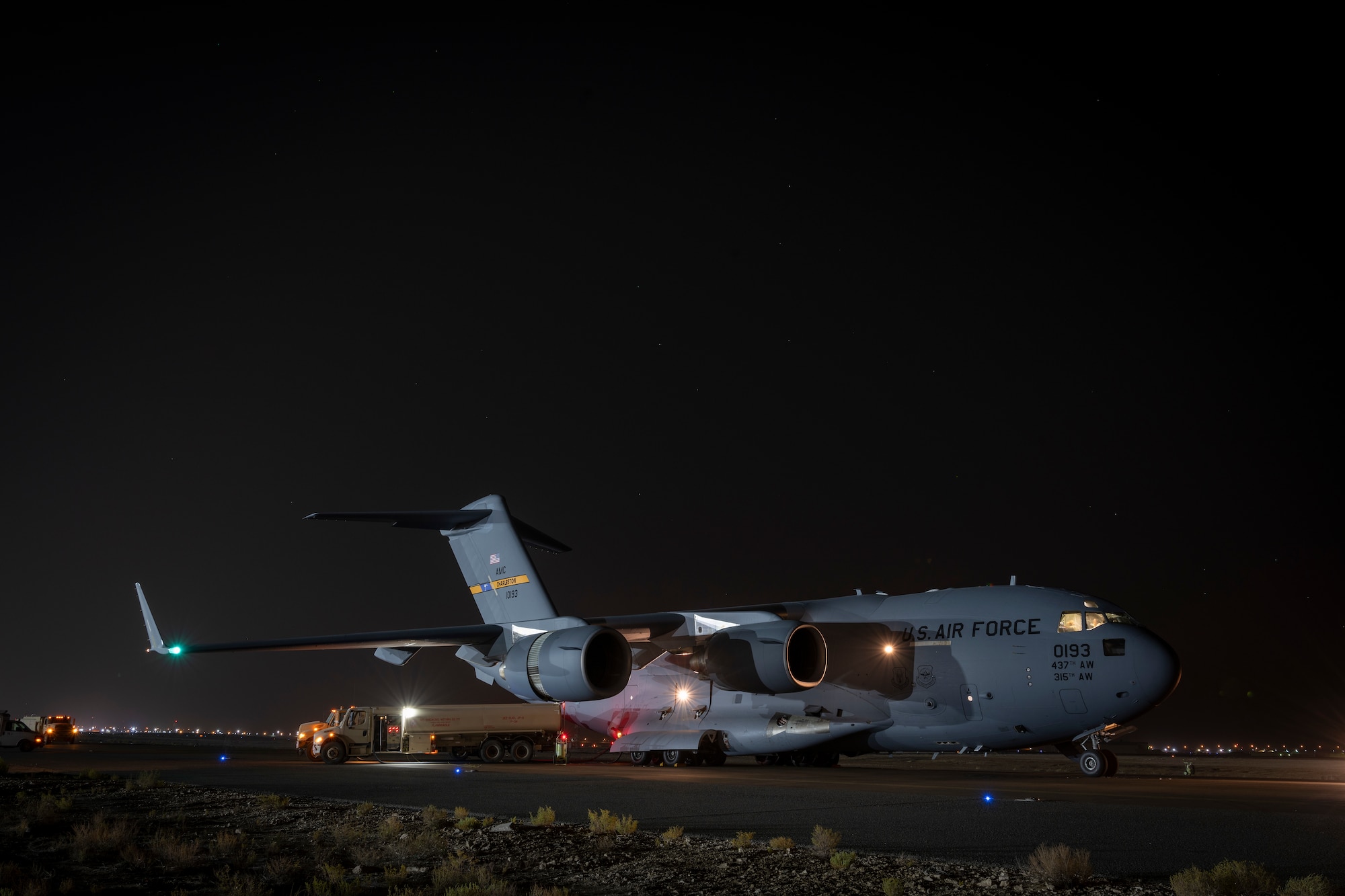 C-17 on runway receiving fuel