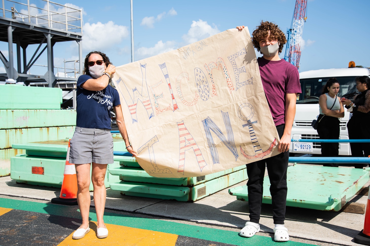YOKOSUKA, Japan (Oct. 04, 2021) Family members welcome Sailors assigned to the Arleigh Burke-class guided-missile destroyer USS Ralph Johnson (DDG 114) as the ship arrives at Commander, Fleet Activities Yokosuka (CFAY) as one of the newest additions to Commander, Task Force (CTF) 71/Destroyer Squadron (DESRON) 15. For more than 75 years, CFAY has provided, maintained, and operated base facilities and services in support of the U.S. 7th Fleet’s forward-deployed naval forces, tenant commands, and thousands of military and civilian personnel and their families (U.S. Navy photo by Tetsuya Morita)