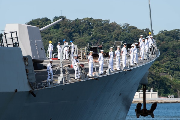 YOKOSUKA, Japan (Oct. 4, 2021) Sailors man the rails aboard the Arleigh Burke-class guided-missile destroyer USS Ralph Johnson (DDG 114) as the ship arrives at Commander, Fleet Activities Yokosuka (CFAY) as one of the newest additions to Commander, Task Force (CTF) 71/Destroyer Squadron (DESRON) 15. For more than 75 years, CFAY has provided, maintained, and operated base facilities and services in support of the U.S. 7th Fleet’s forward-deployed naval forces, tenant commands, and thousands of military and civilian personnel and their families (U.S. Navy photo by Tetsuya Morita)