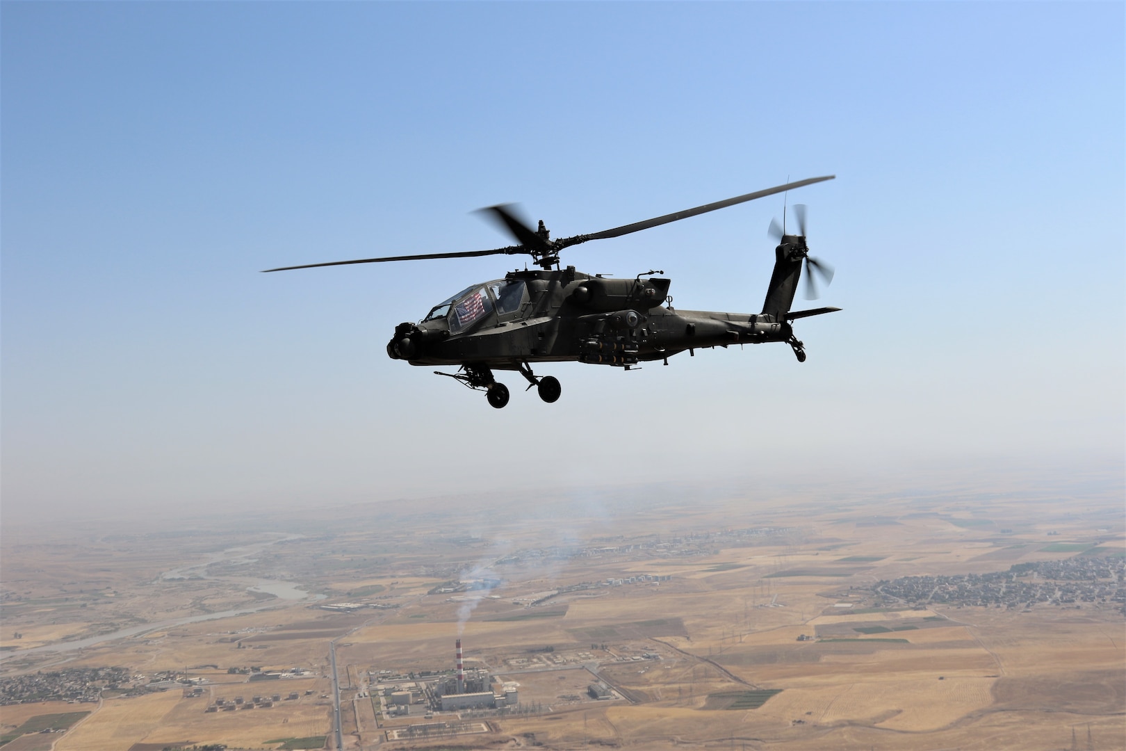 A U.S. Army AH-64 Apache attack helicopter from Task Force Wolfpack, 1st Attack Battalion, 82nd Combat Aviation Brigade, flies over northern Iraq. Wolfpack's highly lethal Apaches serve as air weapons teams on 24-hour alert. They also provide overwatch during ground operations, convoy escort and reconnaissance in support of base defense.