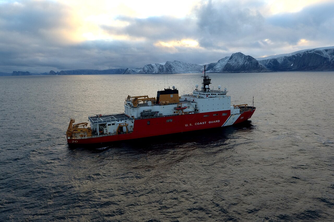 A Coast Guard cutter navigates through the water.