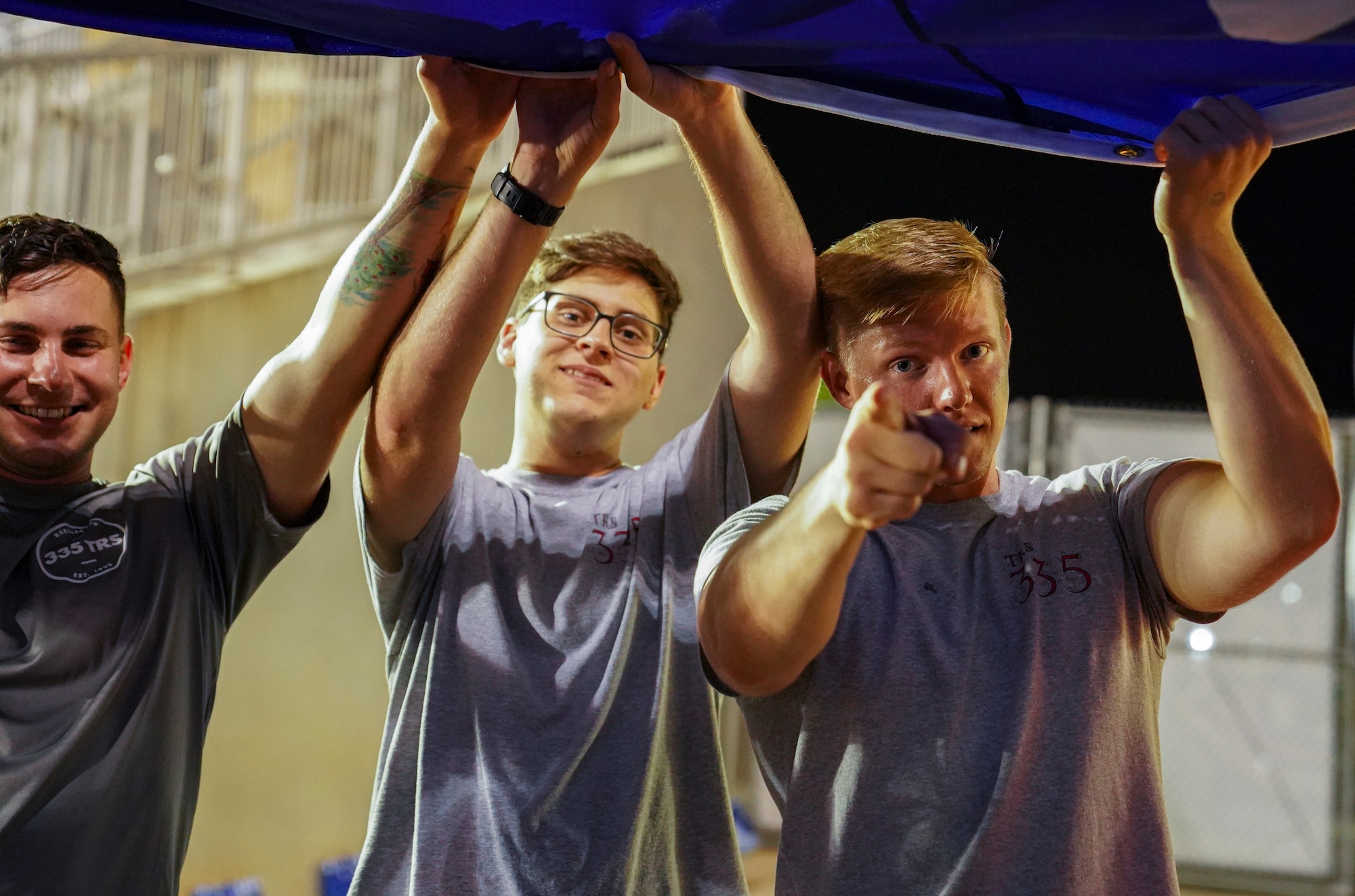 Keesler Airmen hold a U.S. flag during the Biloxi Shuckers Minor League Baseball game in Biloxi, Mississippi, September 18, 2021. The Shuckers hosted a military appreciation night where service members received free tickets. (U.S. Air Force photo by Senior Airman Spencer Tobler)