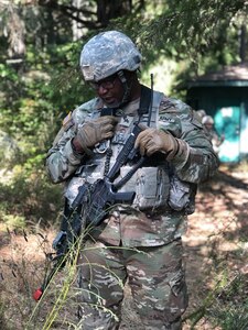 U.S. Army Reserve Sgt. Aaron E. Powe, team leader for Detachment 1270, gives instructions to his team over the radio during a Psychological Operations Team Situational Training Exercise (STX). Soldiers from the 361st Tactical Psychological Operations Company, based in Bothell, Wash., and the 12th Psychological Operations Battalion, headquartered in Mountain View, Calif., conducted tactical psychological operations and collective training Aug. 14 – 23, 2021, Joint Base Lewis McChord, Wash. The exercise is part of the unit’s annual training, focusing on preparing the unit to operate in a multi-domain, hybrid-threat environment.