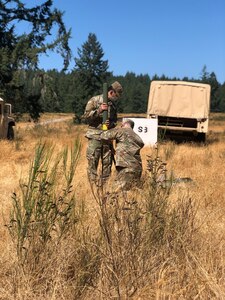 U.S. Army Reserve Staff Sgt. Hynungeeu Choi and Sgt. Scott D. Deoliveira, S-6 noncommissioned officers for the 12th Psychological Operations Battalion, set up a retrains site adjacent to 12th POB’s Tactical Operations Center (TOC). Soldiers from the 361st Tactical Psychological Operations Company, based in Bothell, Wash., and the 12th Psychological Operations Battalion, headquartered in Mountain View, Calif., conducted tactical psychological operations and collective training Aug. 14 – 23, 2021, Joint Base Lewis McChord, Wash. The exercise is part of the unit’s annual training, focusing on preparing the unit to operate in a multi-domain, hybrid-threat environment.