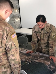 U.S. Army Reserve 1st Lt. Miranda G. Vazquez, S-2 for the 12th Psychological Operations Battalion, prepares an intelligence assessment for the Battalion Commander’s Update Brief (CUB). Soldiers from the 361st Tactical Psychological Operations Company, based in Bothell, Wash., and the 12th Psychological Operations Battalion, headquartered in Mountain View, Calif., conducted tactical psychological operations and collective training Aug. 14 – 23, 2021, Joint Base Lewis McChord, Wash. The exercise is part of the unit’s annual training, focusing on preparing the unit to operate in a multi-domain, hybrid-threat environment.