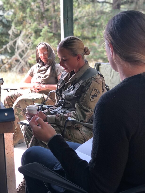 U.S. Army Reserve Sgt. Serena L. Starks, team leader, Detachment 1270, conducts key leader engagement during Psychological Operations Team Situational Training Exercise (STX) lanes. Soldiers from the 361st Tactical Psychological Operations Company, based in Bothell, Wash., and the 12th Psychological Operations Battalion, headquartered in Mountain View, Calif., conducted tactical psychological operations and collective training Aug. 14 – 23, 2021, Joint Base Lewis McChord, Wash. The exercise is part of the unit’s annual training, focusing on preparing the unit to operate in a multi-domain, hybrid-threat environment.