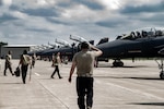 U.S. Air Force pilots and maintainers assigned to the 336th Fighter Squadron prepare F-15E Strike Eagle aircraft on the flightline at Terre Haute Regional Airport in preparation for exercise Jaded Thunder at Hulman Field Air National Guard Base, Ind., Aug. 15, 2021. Hulman Field, which is a dual-purpose, military and civilian airfield, is home to the Indiana National Guard’s 181st Intelligence Wing.