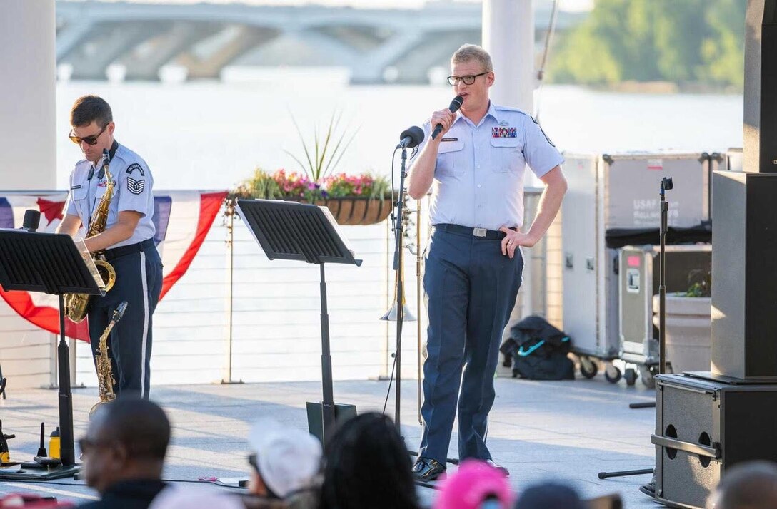 Master Sgt. Kevin Cerovich performs a solo during a U.S. Air Force Band Salute the Sunset series concert at National Harbor. (U.S. Air Force photo by Master Sgt. Valentin Lukashuk)
