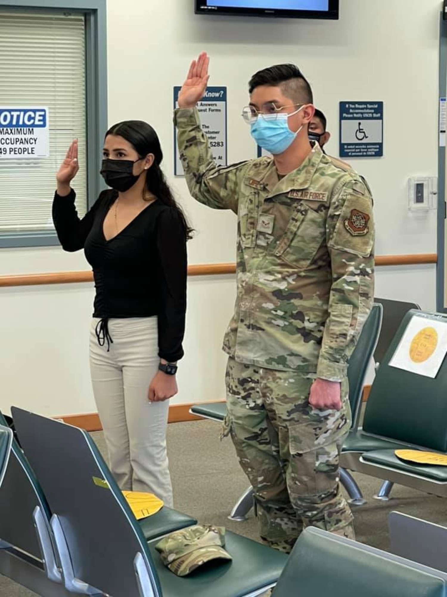 U.S. Air Force Airman Allen Carpio swears in as an official U.S. citizen at Thomas S. Foley Courthouse, Washington, Sept. 17, 2021. Carpio is from the Philippines and he joined the Air Force three years ago. (U.S. Air Force courtesy photo)