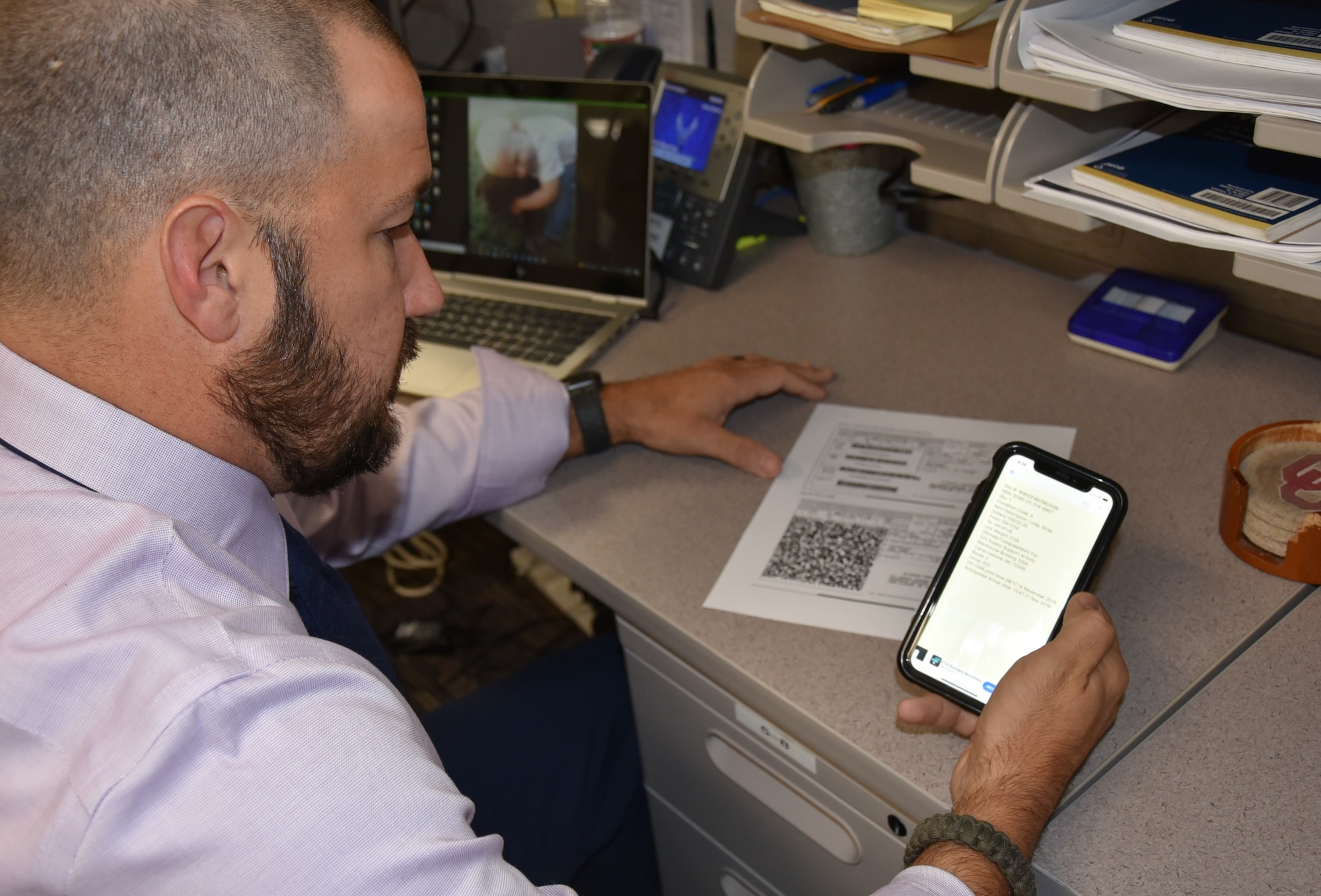 Jason Davis, 429th Supply Chain Management Squadron, demonstrates the amount of data available through a single QR code scan. Davis is an Air Force Materiel Command semi-finalist in the Spark Tank competition thanks to his idea to eliminate scanning errors and improve asset tracking by replacing four barcodes with a single QR code on a DOD form.