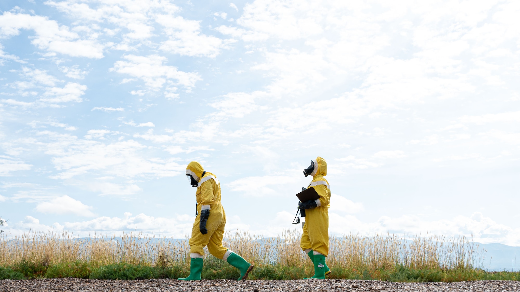 (From left to right) Tech. Sgt. Lisa Sandahl, 49th Civil Engineer Squadron emergency management noncommissioned officer in charge and Airman 1st Class Erika Vega, 49th CES emergency management apprentice, search for a possible radiation source during a radiological survey exercise Oct. 1, 2021 on Holloman Air Force Base, New Mexico. Survey teams typically consist of two to three people, and radiation is detected using ADM-300 radiation survey meters. (U.S. Air Force photo by Tech. Sgt. BreeAnn Sachs)
