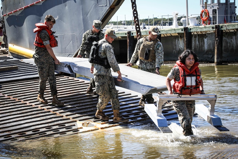 September 24, 2021 | Naval Support Activity Indian Head, Md. – U.S. Marines and Sailors with Chemical Biological Incident Response Force (CBIRF) conduct Capital Shield aboard Naval Support Activity Indian Head, Md, on Sept. 24, 2021. Capital Shield is conducted to give CBIRF personnel experience with an amphibious response in the event that CBIRF is called to respond, and conventional roads are unavailable. (Official U.S. Marine Corps photo by SSgt. Kristian S. KarstenReleased)