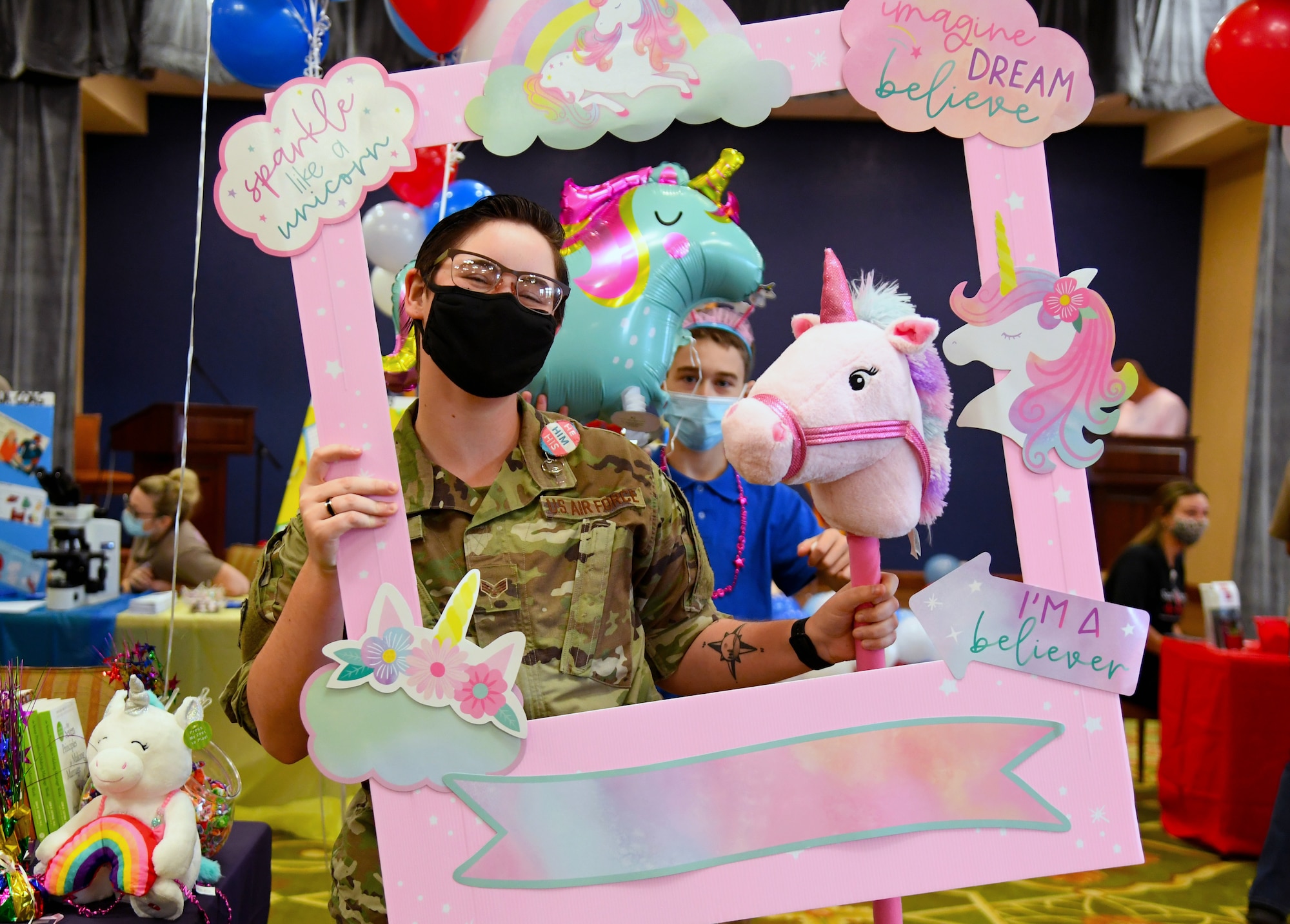 U.S. Air Force Senior Airman Ryan Boudreau, 81st Operational Medical Readiness Squadron mental health technician, poses for a photo during the 10th Annual 81st Medical Group Health Expo inside the Bay Breeze Event Center at Keesler Air Force Base, Mississippi, October 1, 2021. The 81st MDG hosted the walk-in event which included information booths and scheduling appointments for multiple types of cancer and chronic diseases in honor of Breast Cancer Awareness Month. (U.S. Air Force photo by Kemberly Groue)