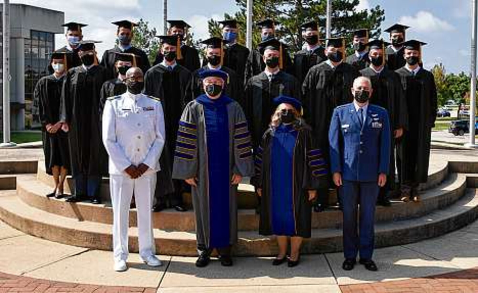 The Air Force Institute of Technology’s Graduate School of Engineering and Management held a ceremony Sept. 16 for 17 students earning doctoral degrees. The newly minted Ph.D.s join a group of more than 960 other AFIT doctorate alumni. (U.S. AIR FORCE PHOTO/2ND LT. ANDREW LOWE)