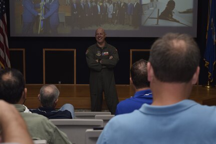 Col. James “JC” Miller, 433rd Operations Group commander, briefs 17 San Antonio area civic leaders at the 433rd Airlift Wing Auditorium on Joint Base-San Antonio-Lackland, Texas, Oct. 2, 2021. The civic leader tour included a C-5M Super Galaxy local training flight, which featured an in-flight refueling demonstration. (U.S. Air Force photo by Senior Airman Brittany Wich)
