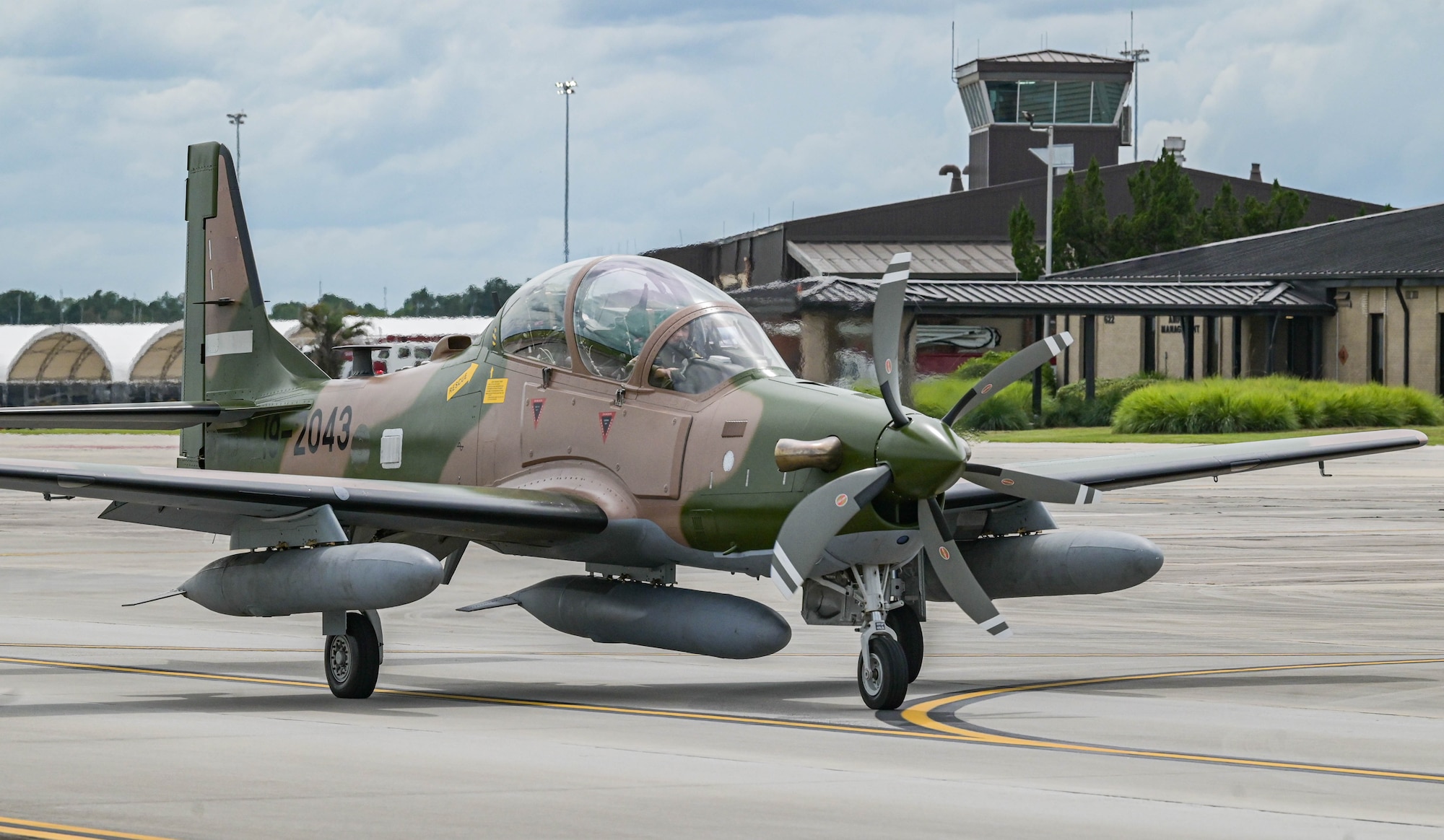 An A-29 Super Tucano aircraft pilot taxis down the runway to depart Moody Air Force Base, Georgia, Sept. 15, 2021. The U.S. government sold 12 A-29 aircraft to the Nigerian Air Force to enhance their capabilities in providing national security for Nigeria. (U.S. Air Force photo by Senior Airman Rebeckah Medeiros)