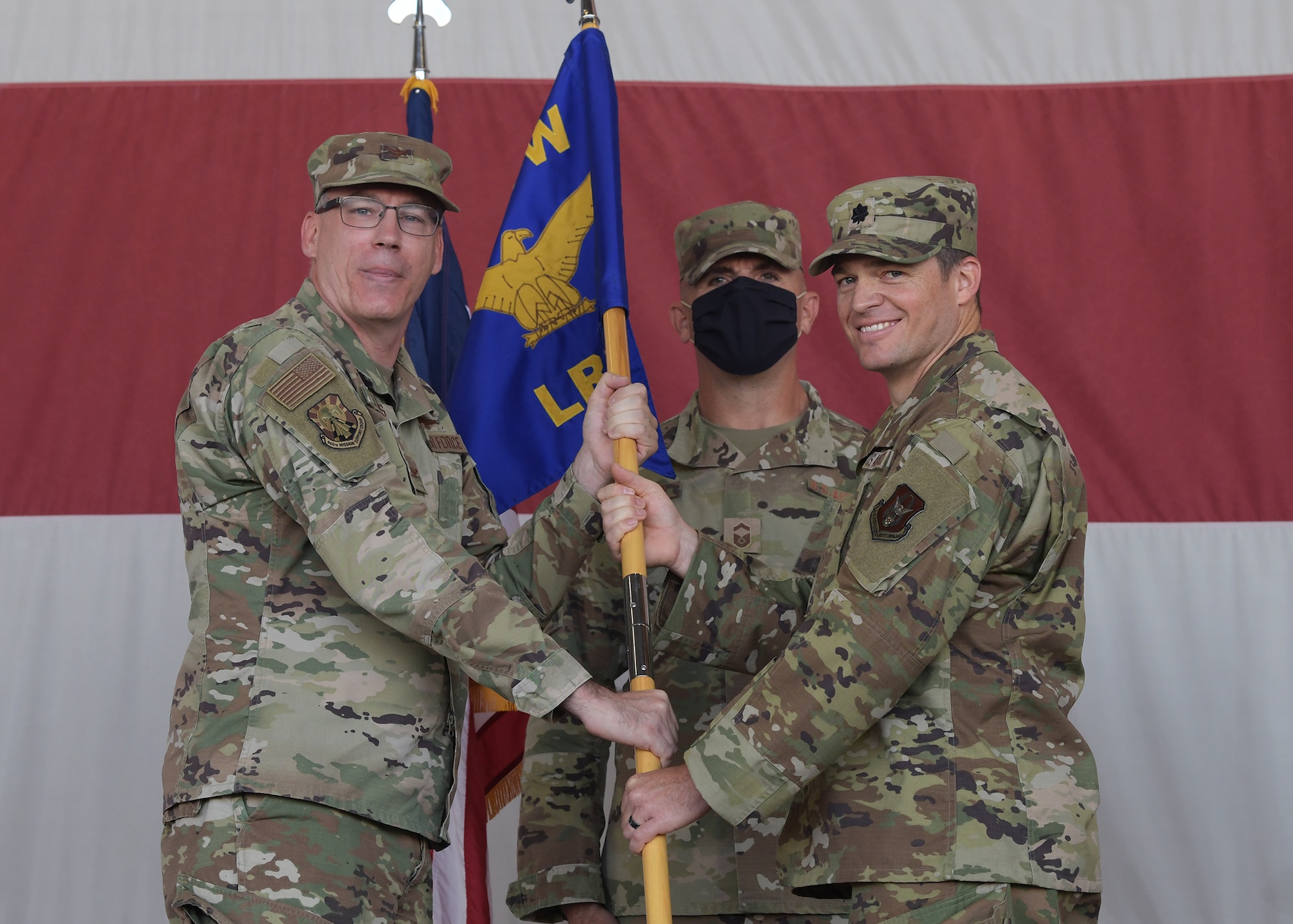The 944th Logistics Readiness Squadron held a change of command ceremony at Luke Air Force Base, Arizona, October 2, 2021. Reserve Citizen Airman Lt. Col. Ronald J. ‘Smokin’ Sloma, 944th LRS outgoing commander, relinquished command to Reserve Citizen Airman Lt. Col. Jalen A. ‘Rex’ Whitener, in-coming commander, in front of family, friends, and military members.