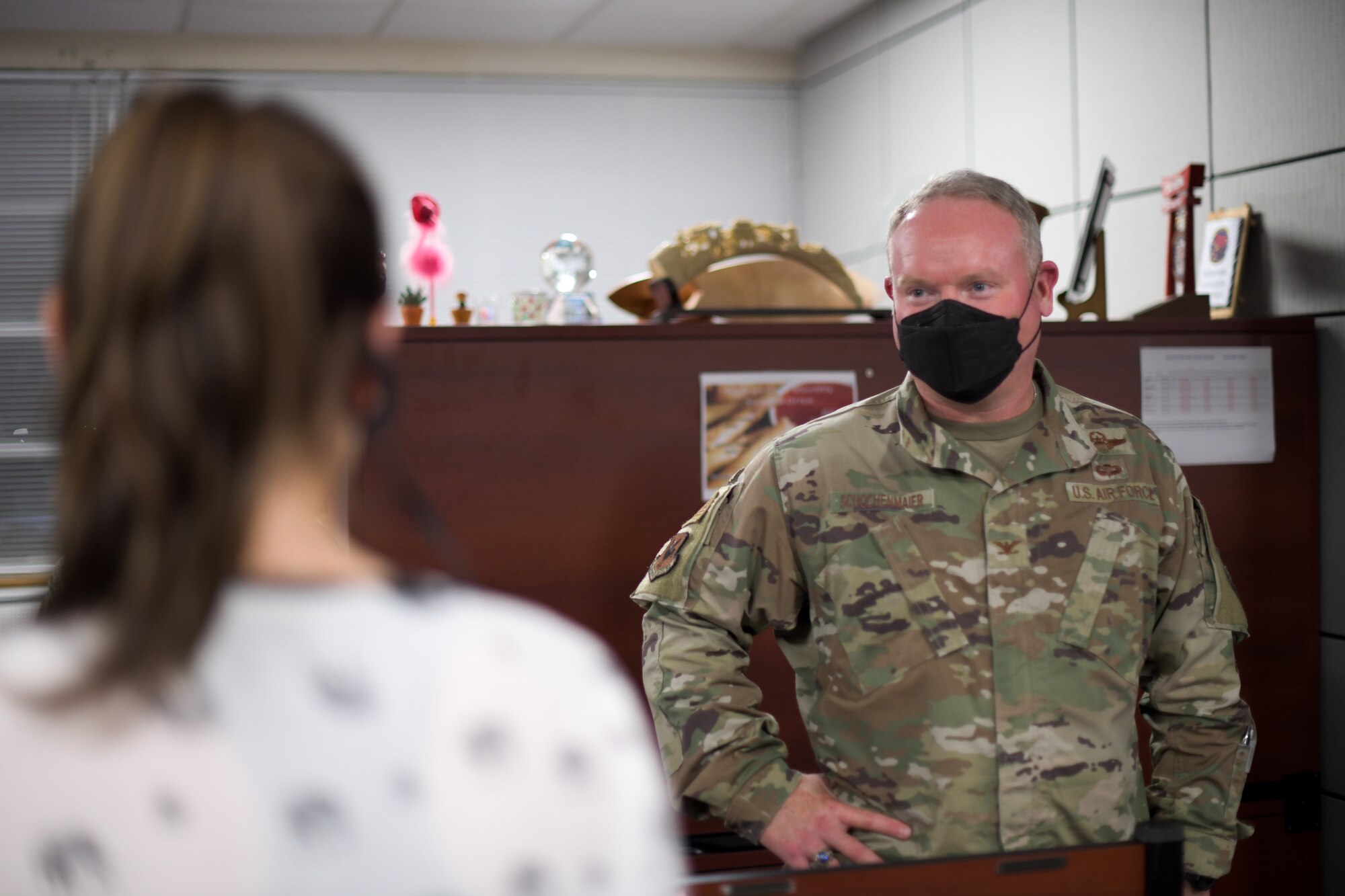 U.S. Air Force Colonel speaks with Airmen