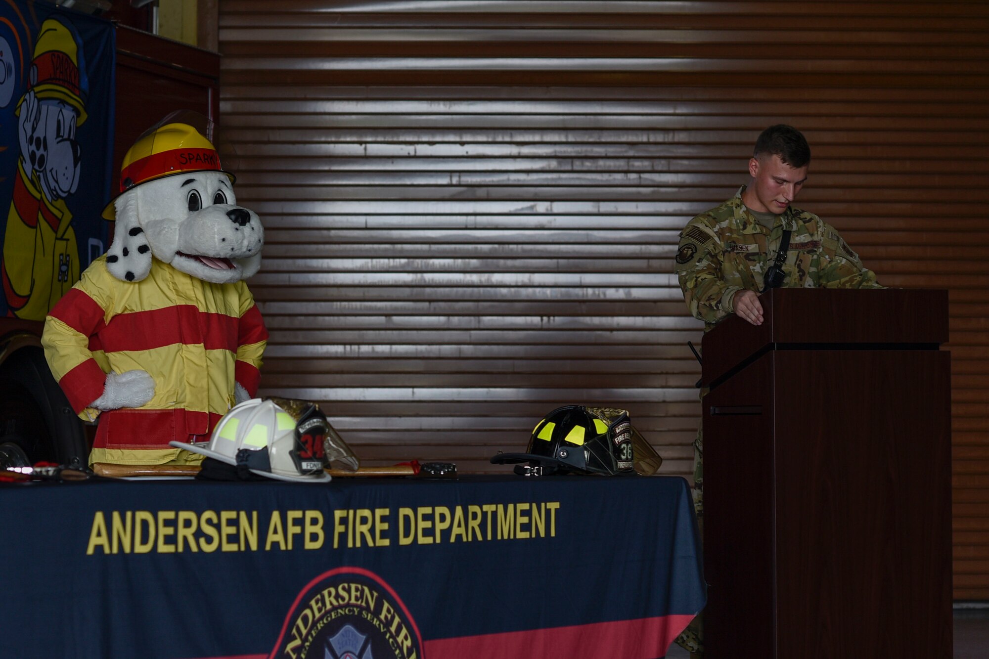 A man gives a speech from a podium.