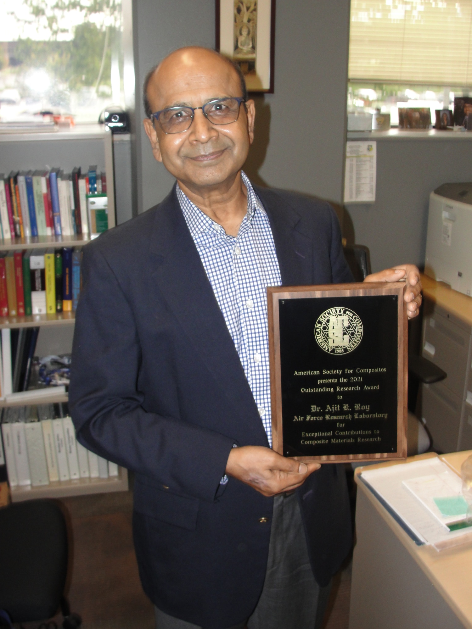 The American Society for Composites recently acknowledged Dr. Ajit Roy, of the Air Force Research Laboratory’s Materials and Manufacturing Directorate, with its Outstanding Research Award for Exceptional Contributions to Composite Research. (U.S. Air Force photo/Patrick Foose)