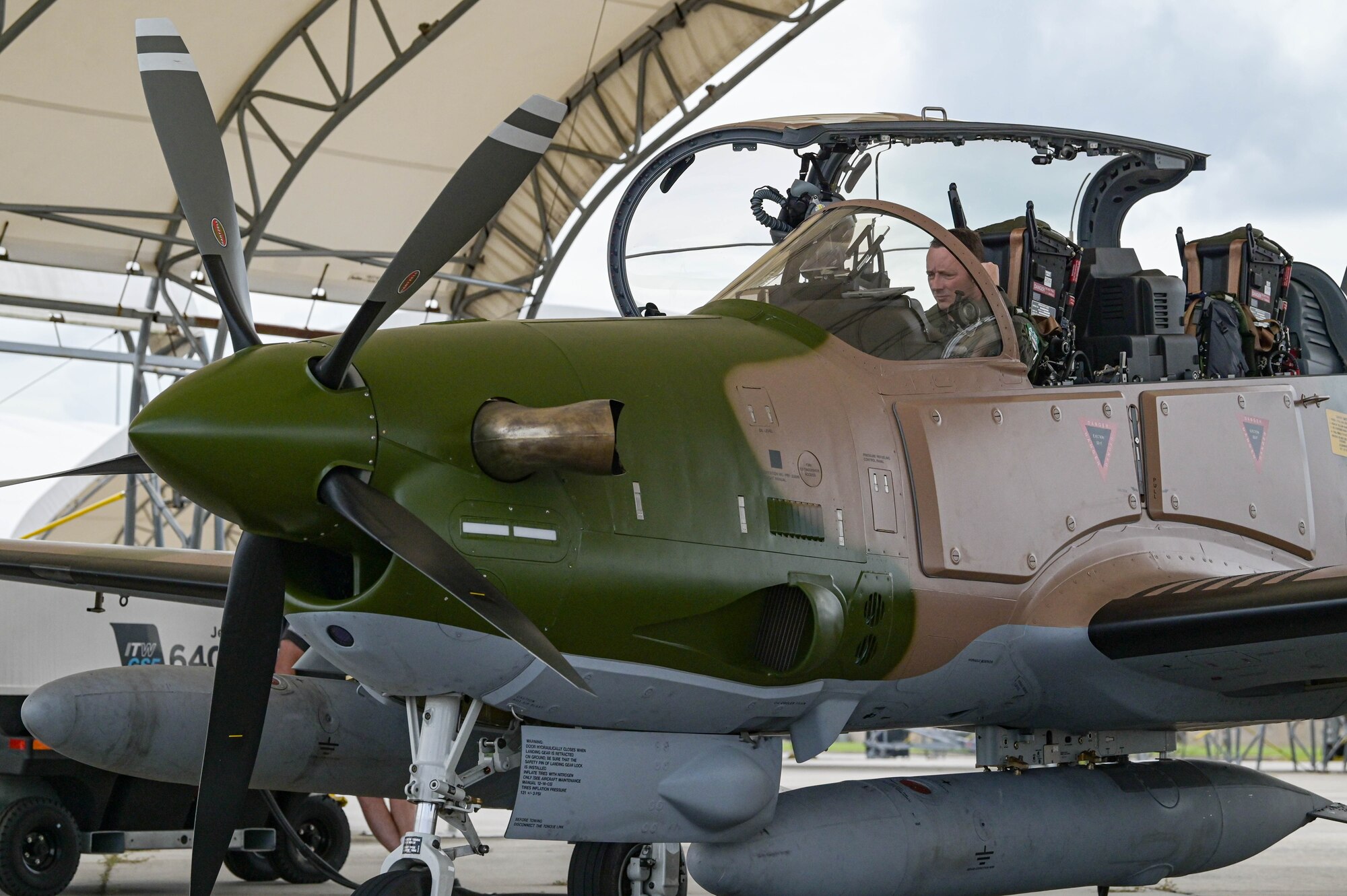 An A-29 Super Tucano aircraft pilot from the 81st Fighter Squadron performs a preflight inspection at Moody Air Force Base, Georgia, Sept. 15, 2021. Nigeria purchased the A-29s through the Foreign Military Sales program, following the Department of Defense’s “Total Package Approach” model. The nearly $500 million sale is the largest FMS program in sub-Saharan Africa. (U.S. Air Force photo by Senior Airman Rebeckah Medeiros)