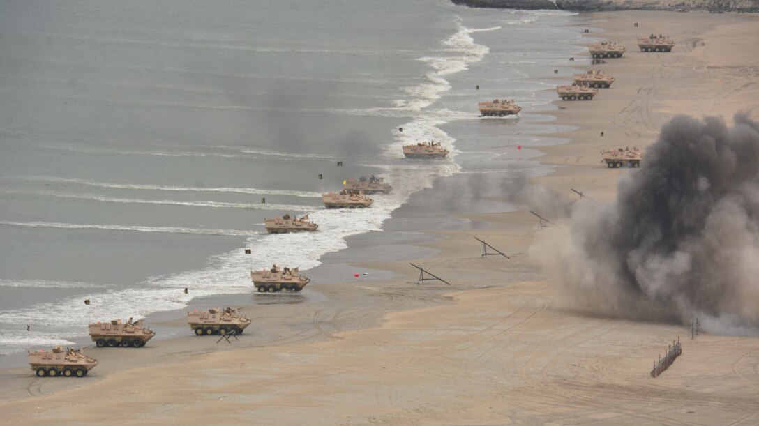 Peruvian marine amphibious assault vehicles land on Las Salinas Beach as part of the amphibious assault during UNITAS LXII.