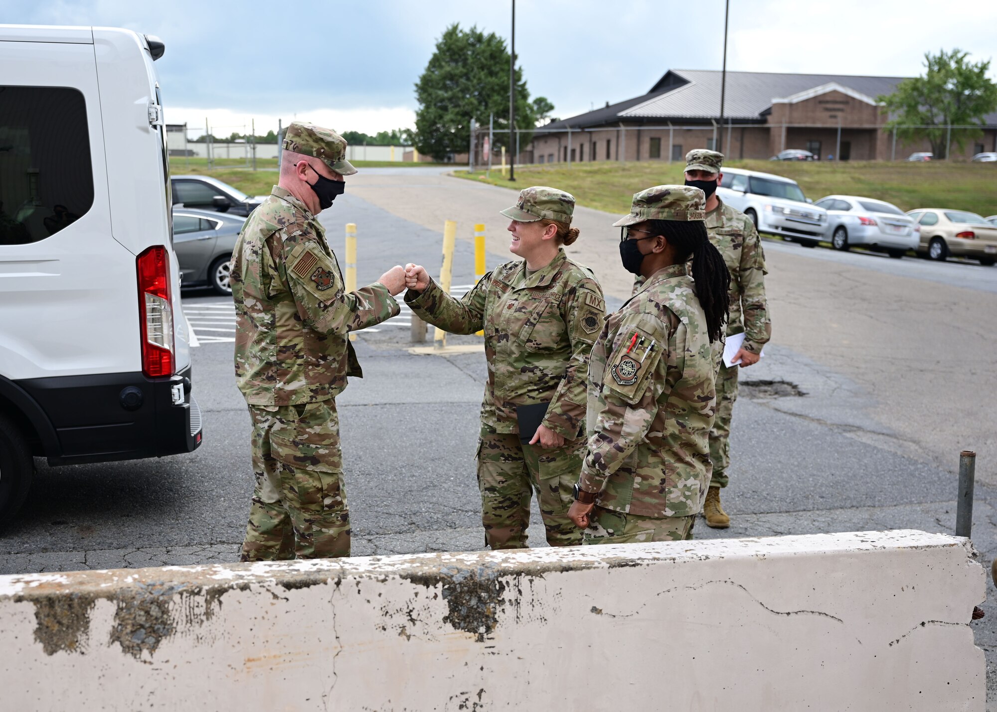 A person is greeted by a group of people