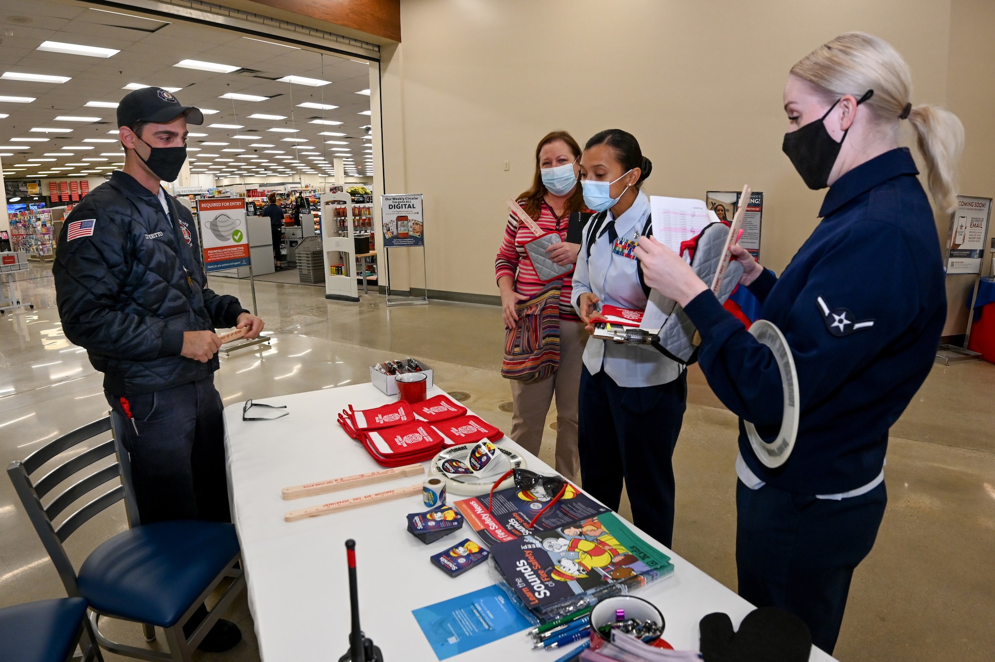 Hanscom Fire Lt. Casey Videtto, speaks to members of Public Health