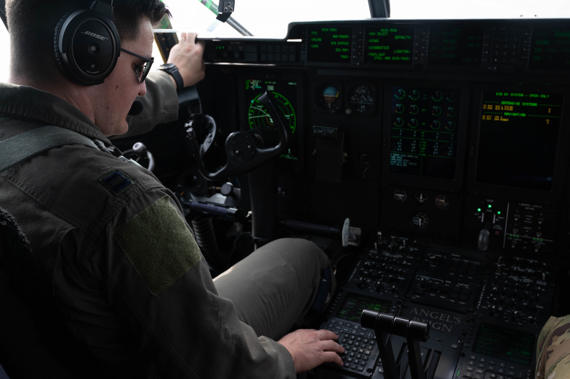An Airman performs flight checks.
