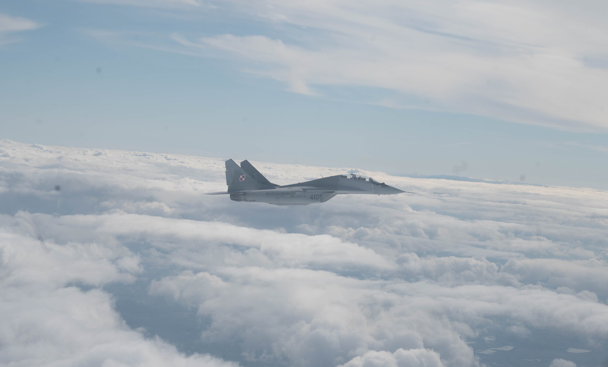 A jet fighter flies in Polish airspace.