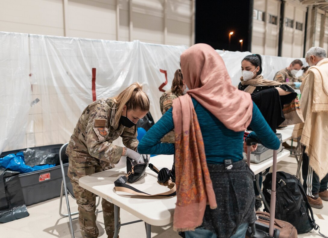 Airman conducts passenger terminal functions.