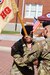 Capt. Marco G. Lara, commander, Headquarters and Headquarters Company, Special Troops Battalion, 1st Theater Sustainment Command, passes the guidon to 1st Sgt. Charles L. York, incoming first sergeant, HHC, STB, 1st TSC, during the company's change of responsibility ceremony at Fort Knox, Kentucky, Oct 1., 2021. The passing of the guidon symbolizes the transition of responsibility from one first sergeant to another.