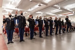 Seventeen Virginia Army National Guard officer candidates celebrate their graduation from Officer Candidate School Sept. 19, 2021, at a ceremony held at the Virginia National Guard Sergeant Bob Slaughter Headquarters at Defense Supply Center Richmond, Virginia. Of the 17 graduates, 13 accepted their commissions, took their oath of office, and pinned on their lieutenant bars. Alumi from previous OCS classes participated in a presentation of a historic guidon from OCS Class 11 and the Troutville-based 29th Infantry Division Band provided ceremonial music for the occasion. (U.S. Army National Guard photo by Staff Sgt. Lisa M. Sadler)