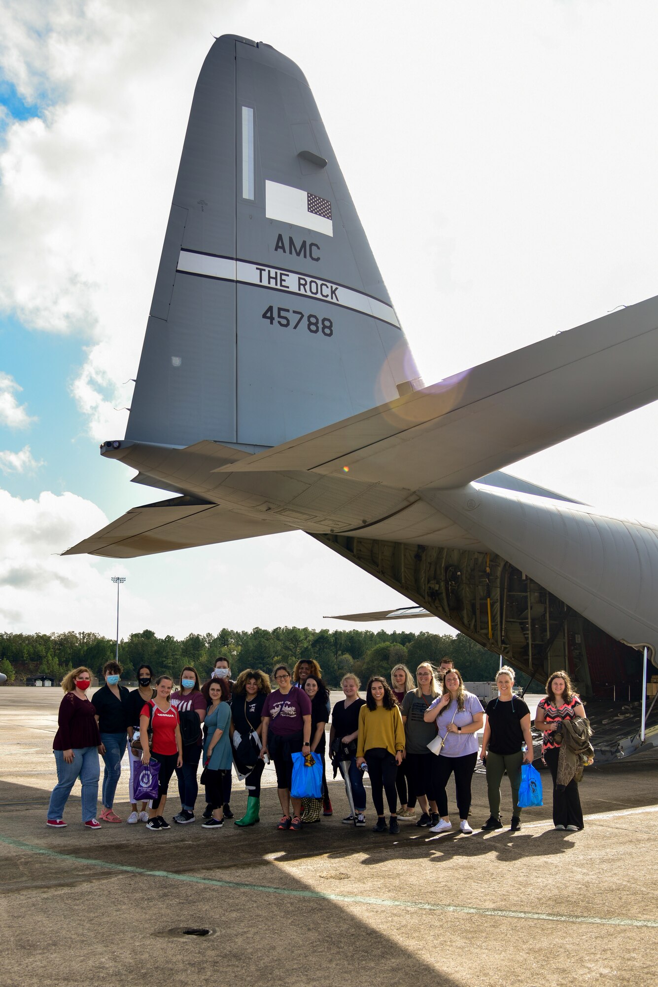 A group of people pose for a photo