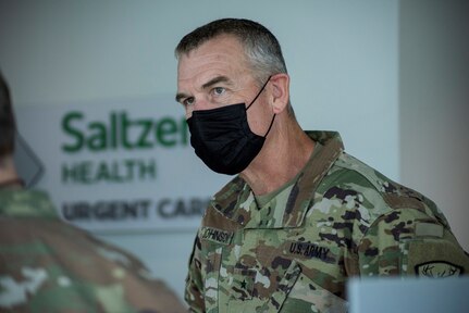 Brig. Gen. Russ Johnson, Idaho National Guard director of joint staff, visits Idaho National Guard Soldiers and Airmen at medical facilities in Idaho, Oct. 1, 2021, after being appointed the state's first dual-status commander of its COVID-19 response.