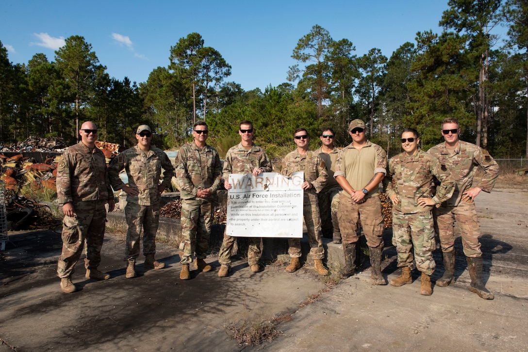 A photo of Airmen posing for a photo.