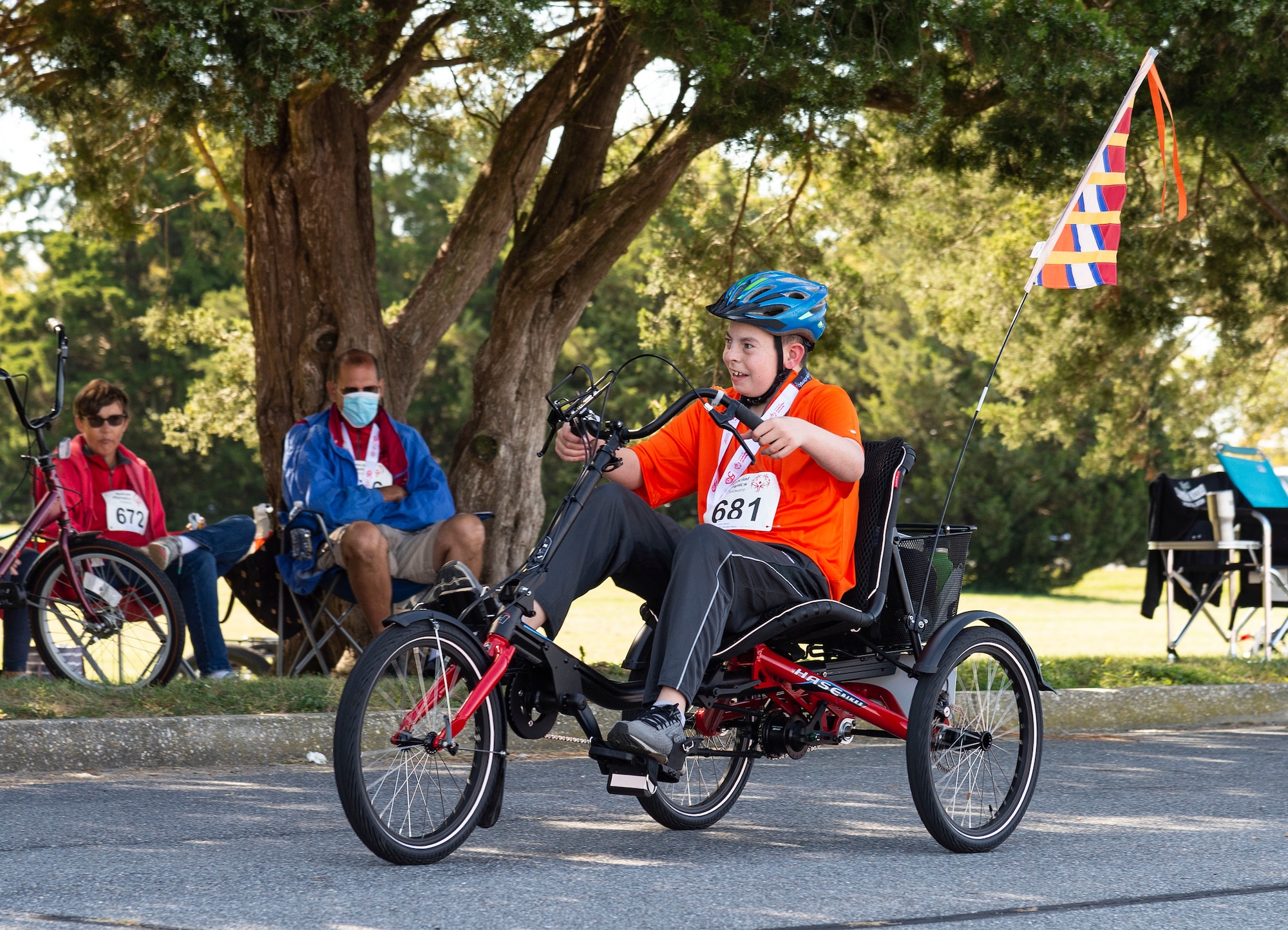 Matthew Lavelle, of the Wilmington Wizards, pedals his way to the finish line at the 2021 Special Olympics Delaware Cycling Classic at Dover Air Force Base, Delaware, Oct. 2, 2021. Lavelle competed in the 1K and 2K tricycle races. (U.S. Air Force photo by Roland Balik)
