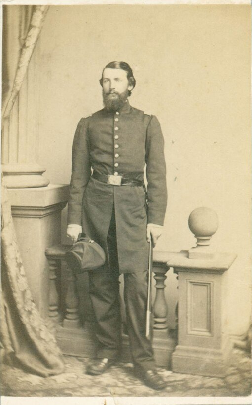 Soldier poses for photo.