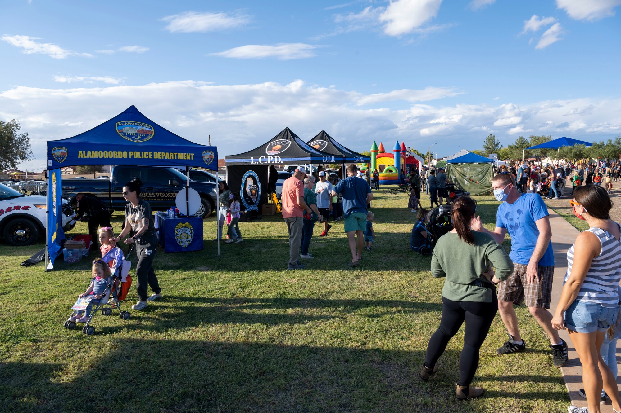 Members of Team Holloman and Alamogordo residents participate in the annual National Night Out event hosted by Soaring Heights Communities Oct. 1, 2021 on Holloman Air Force Base, N.M. During the event, base and local first responders had booths giving information on their job duties. (U.S. Air Force photo by Senior Airman Kristin Weathersby)