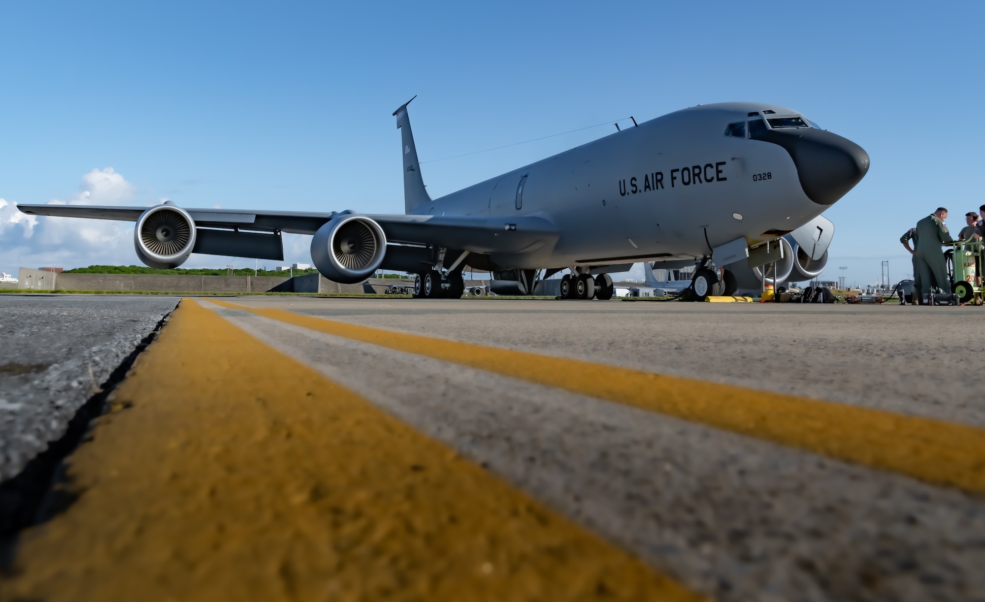 Boom operators from the 909th Air Refueling Squadron refuel F-15C Eagles.