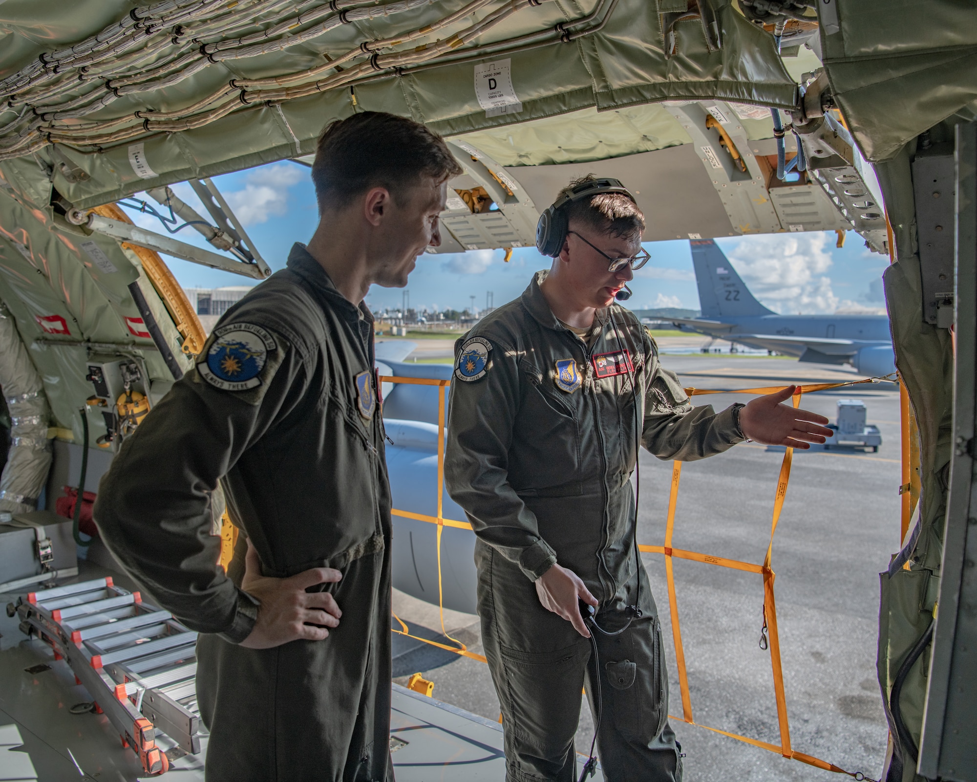Boom operators from the 909th Air Refueling Squadron refuel F-15C Eagles.