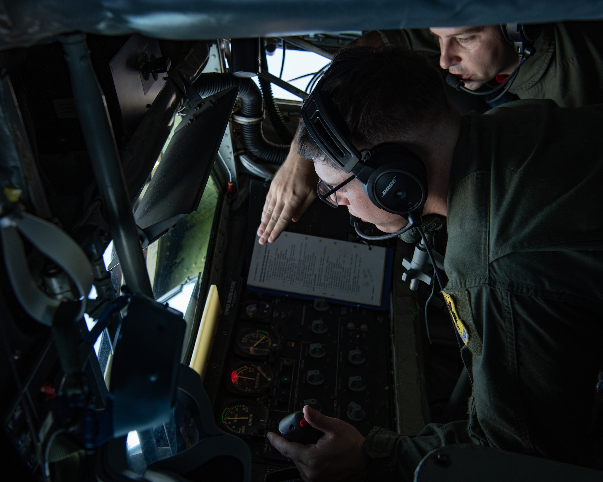 Boom operators from the 909th Air Refueling Squadron refuel F-15C Eagles.