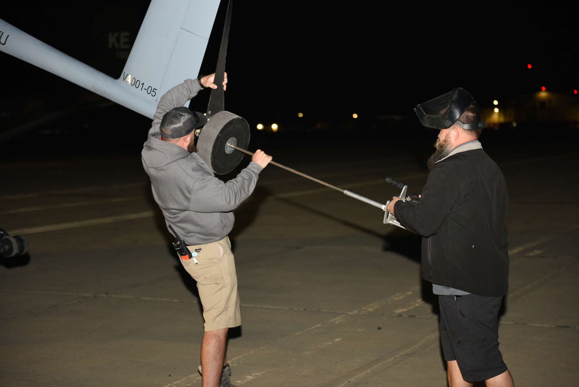 Platform Aerospace personnel prepare a Vanilla unmanned aircraft system for its record-breaking flight at Edwards Air Force Base, California, Sept. 24. The aircraft broke the world record for unrefueled, internal combustion endurance of an unmanned aircraft with a total continuous flight time of 8 days, 50 minutes, and 47 seconds, and 12,200 miles, Oct. 2. (Air Force photo by Bryce Bennett)