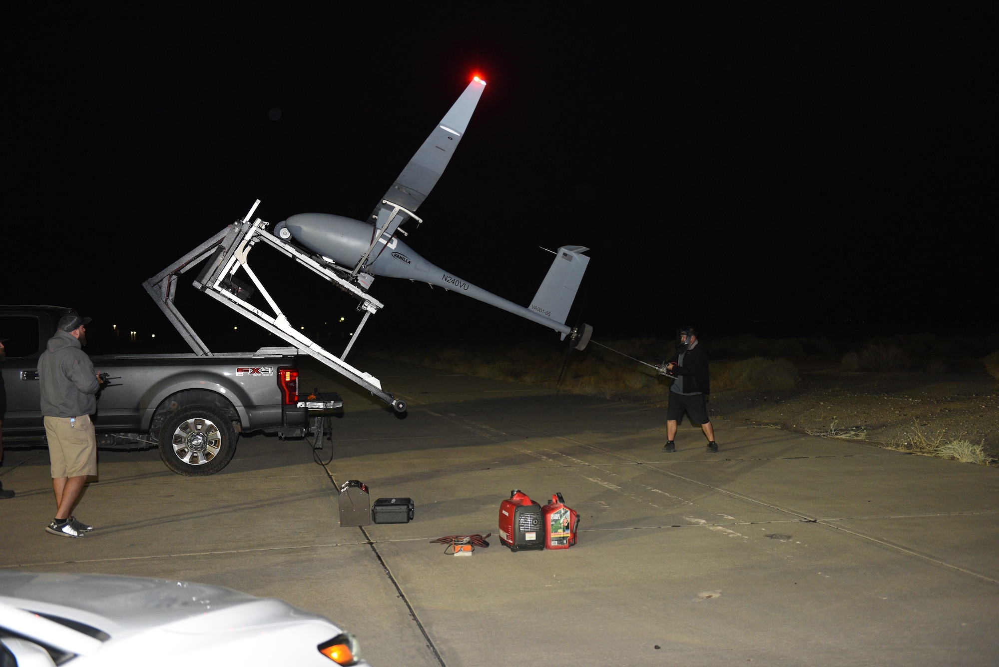Platform Aerospace personnel prepare a Vanilla unmanned aircraft system for its record-breaking flight at Edwards Air Force Base, California, Sept. 24. The aircraft broke the world record for unrefueled, internal combustion endurance of an unmanned aircraft with a total continuous flight time of 8 days, 50 minutes, and 47 seconds, and 12,200 miles, Oct. 2. (Air Force photo by Bryce Bennett)