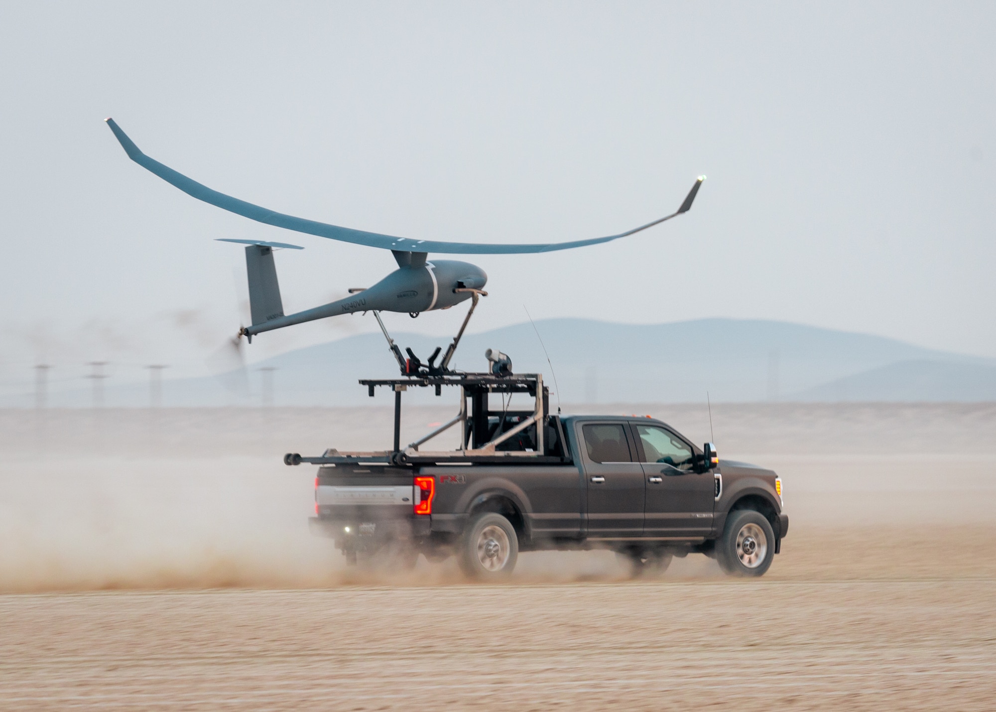 A Vanilla unmanned aircraft system launches from the Rogers Dry Lakebed on Edwards Air Force Base, California, Sept. 24. The aircraft broke the world record for unrefueled, internal combustion endurance of an unmanned aircraft with a total continuous flight time of 8 days, 50 minutes, and 47 seconds, and 12,200 miles, Oct. 2. (Air Force photo by Josh McClanahan)