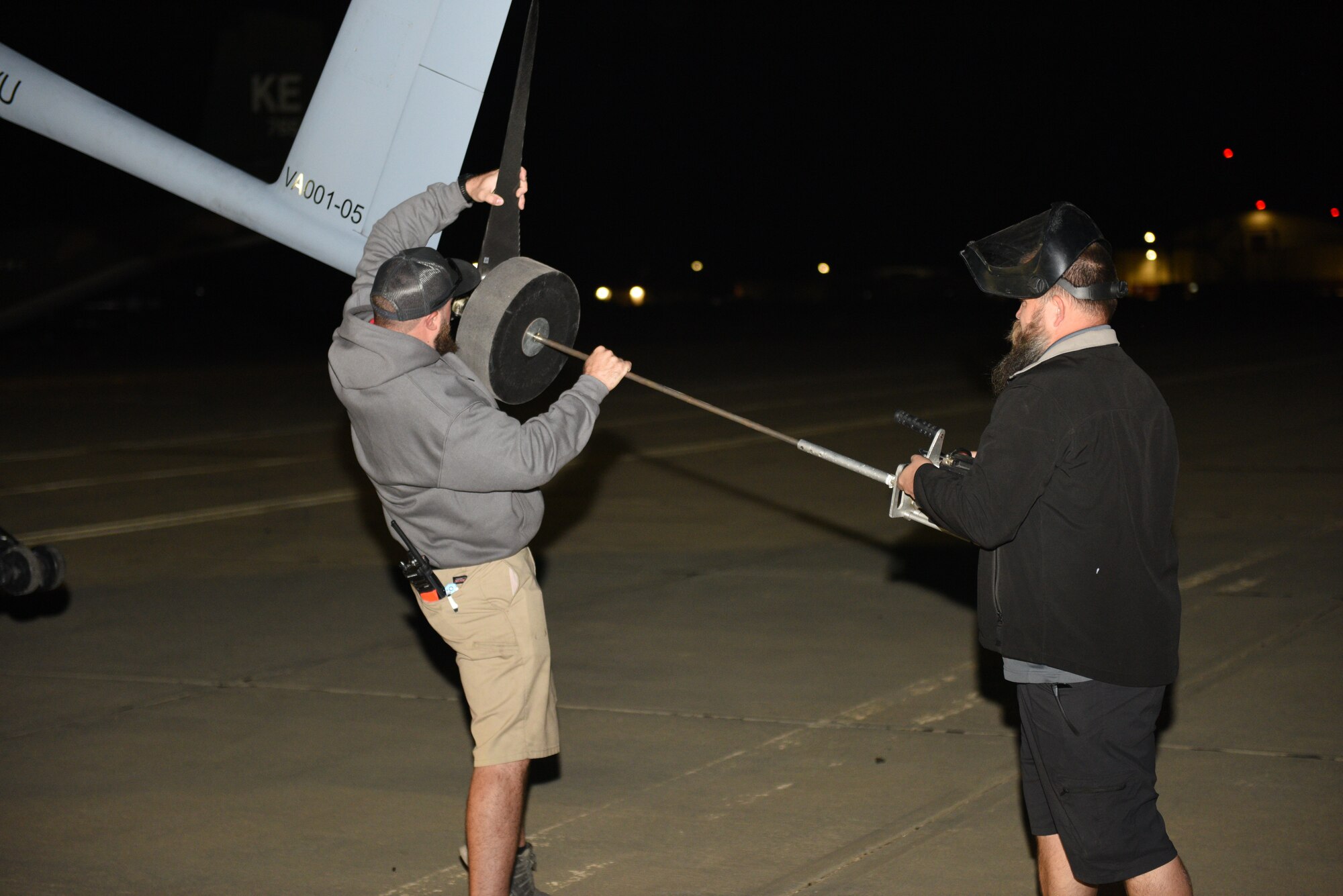 Platform Aerospace personnel prepare a Vanilla unmanned aircraft system for its record-breaking flight at Edwards Air Force Base, California, Sept. 24. The aircraft broke the world record for unrefueled, internal combustion endurance of an unmanned aircraft with a total continuous flight time of 8 days, 50 minutes, and 47 seconds, and 12,200 miles, Oct. 2. (Air Force photo by Bryce Bennett)