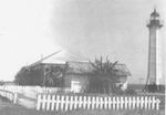 Circa 1940 photograph showing keepers quarters and “U.S. Coast Guard” painted on the side of the storage shed. (Photo courtesy of the Guantanamo Public Memory Project)