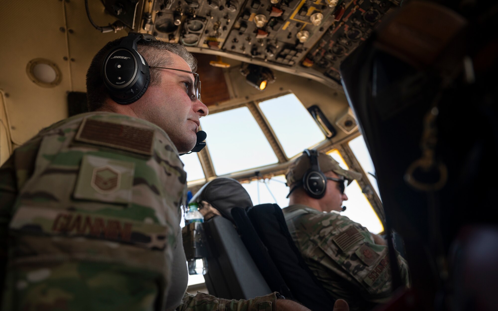 Master Sgt. Steven Giannini, a flight engineer with the 779th Expeditionary Airlift Squadron, observes pre-flight checks on a C-130H Hercules at Ali Al Salem Air Base, Kuwait, Sept. 16, 2021.