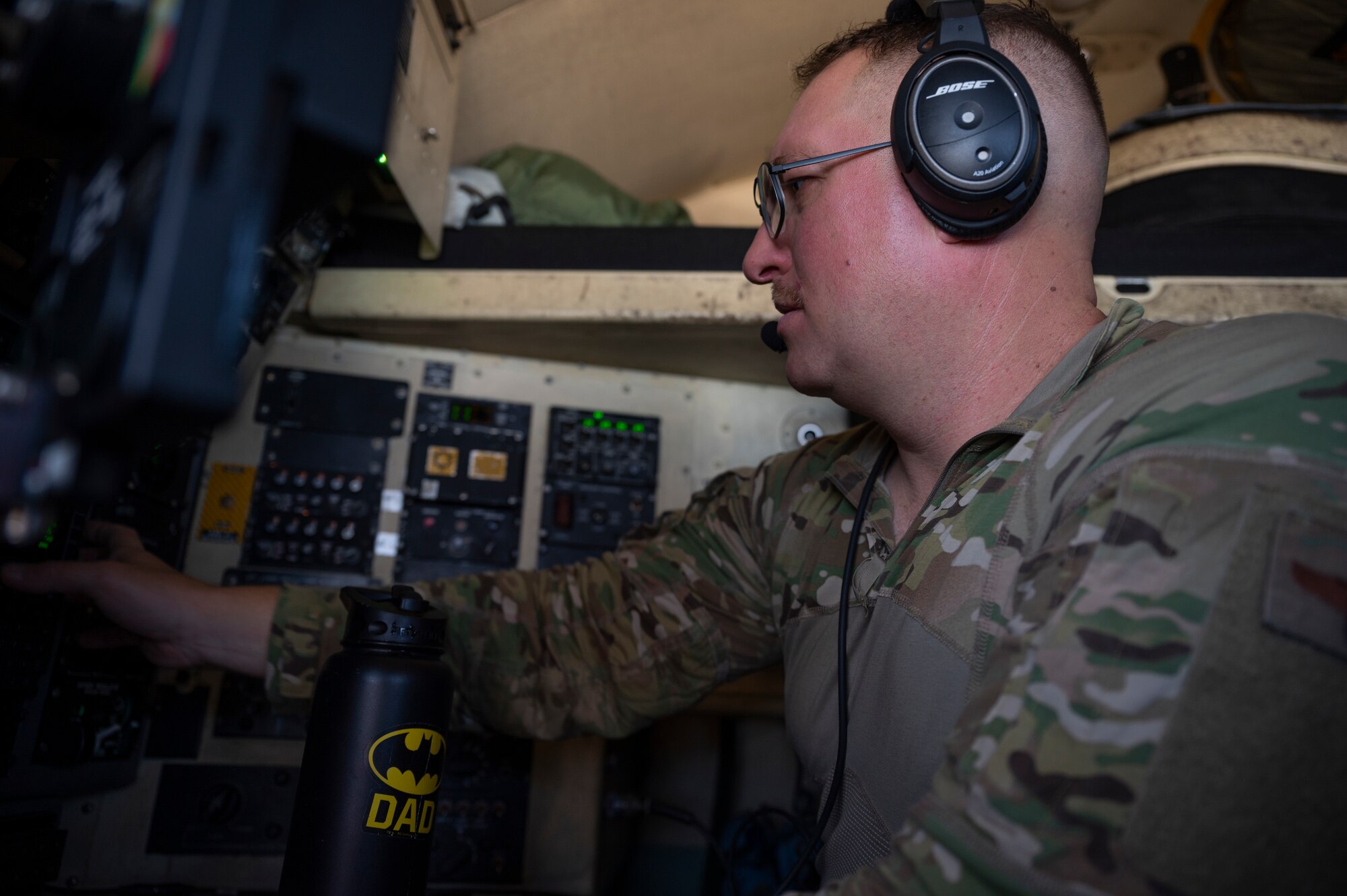 U.S. Air Force Capt. John-David Green, a navigator with the 779th Expeditionary Airlift Squadron, conducts pre-flight checks on a C-130H Hercules at Ali Al Salem Air Base, Kuwait, Sept. 16, 2021.